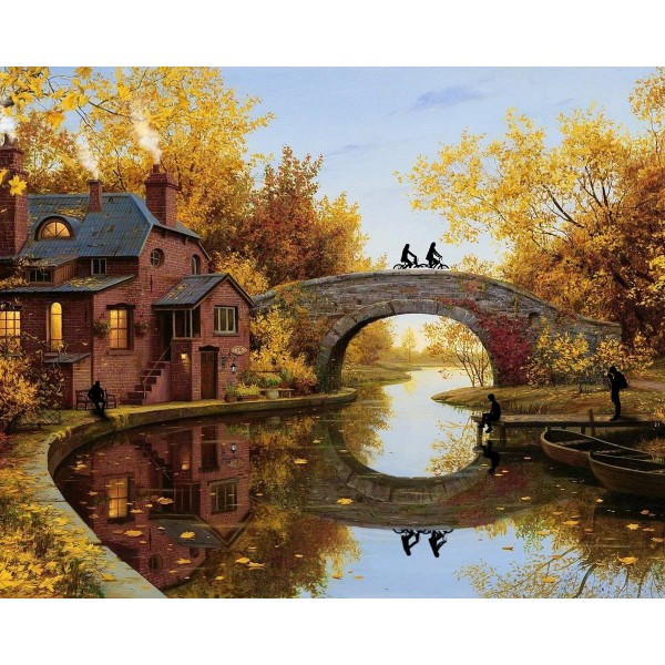 Casa sul fiume in autunno